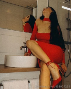 The mirror reflects not only beauty but also confidence red is my