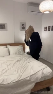 Slowly i unfasten my robe each step in my heels like a promise my