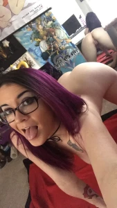 Bent over with a mirror