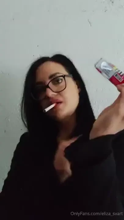 First cig of the day on a very cold may-morning with plump glossy lips 