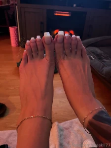 Photo set focusing on my bare long toenails part 1