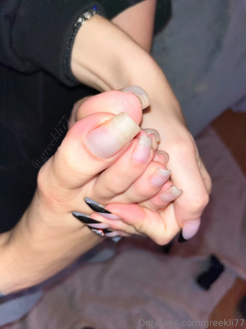 Photo set focusing on my bare long toenails 
