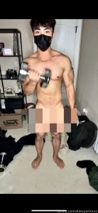 Flexing nude lifting weights and jerking off