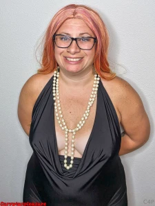 Little black dress pearl necklace and red head photo shoot brings out