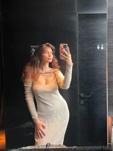Figure like chocolate sweet pleasure complementing the dress with its