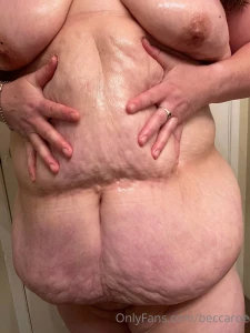 Enjoy these pictures of my oiled up belly tits and ass video soon bbw part 3