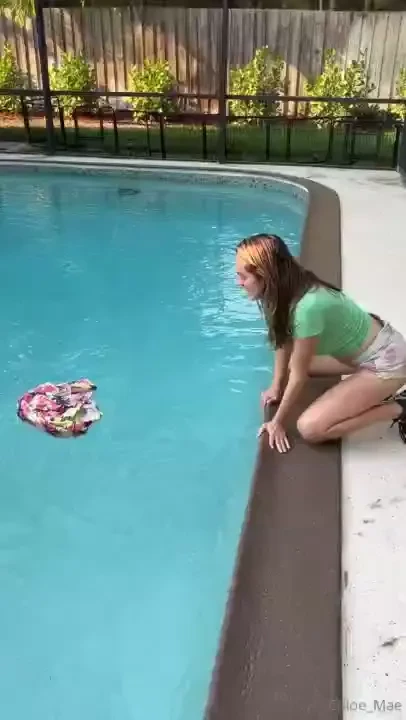 Uhh don t mind me just fishing the pool boys shorts out of the pool 