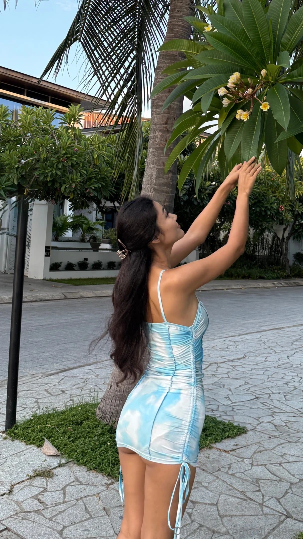 Palm trees soft breeze and me in this little dreamy dress what more do 
