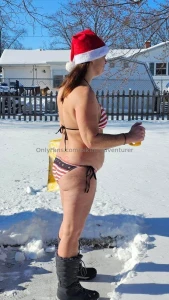 Cleaning up the snow in my new santa bkkini part 3