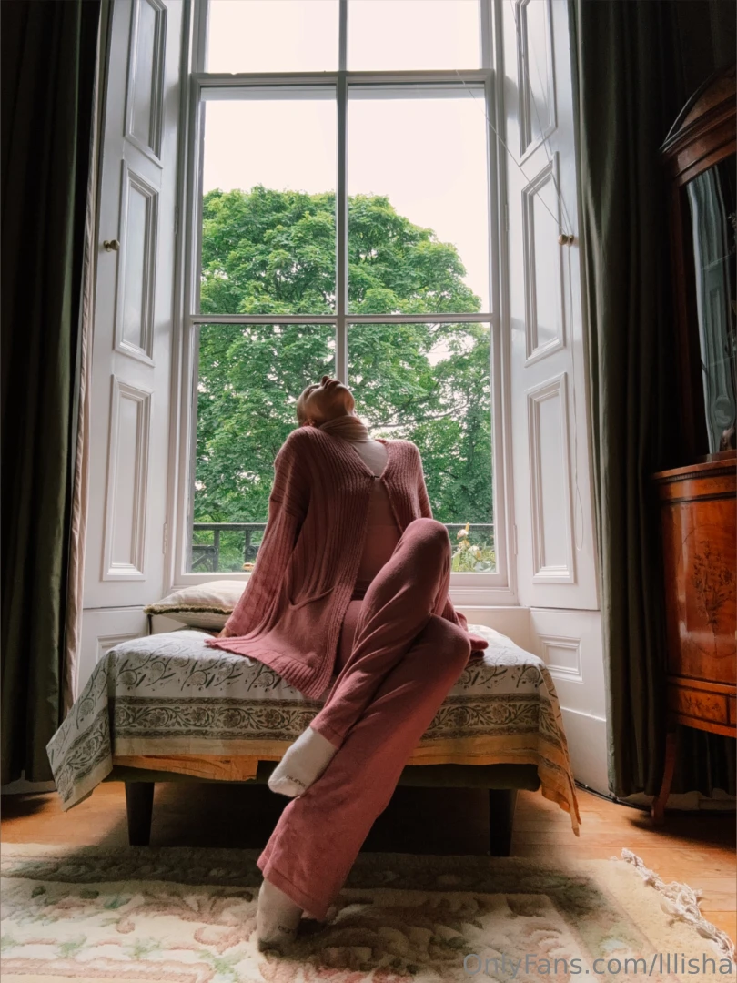 Nbsp nbsp nbsp she was seated comfortably on a sofa by the window 