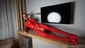 I m slipping into this fiery red latex catsuit imagining the way your