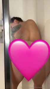 I stuck a toy to the shower wall and got off with the water running