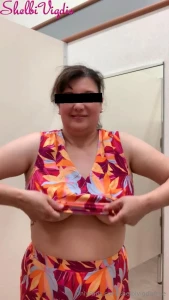 Changing out of an outfit in the dressing room tip to see the part 1