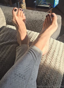 Sole scrunchies toe wiggles relaxing on the couch enjoying this sun