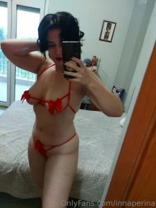 Gift in red ribbon open up please