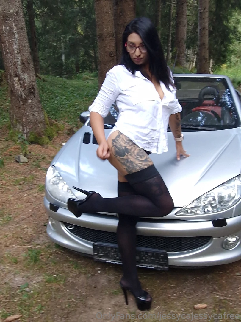 The grass soft beneath my feet as i lean against the car the 