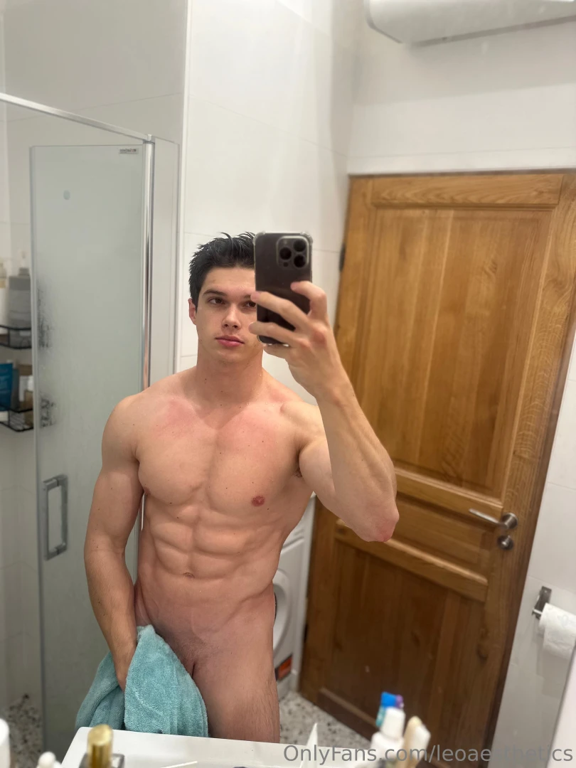 Naked in the mirror just this towel in my hand barely hiding this fat 