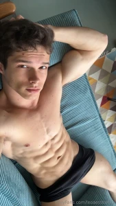 Laid out on the couch shirt off cock thick and hard in my brief you