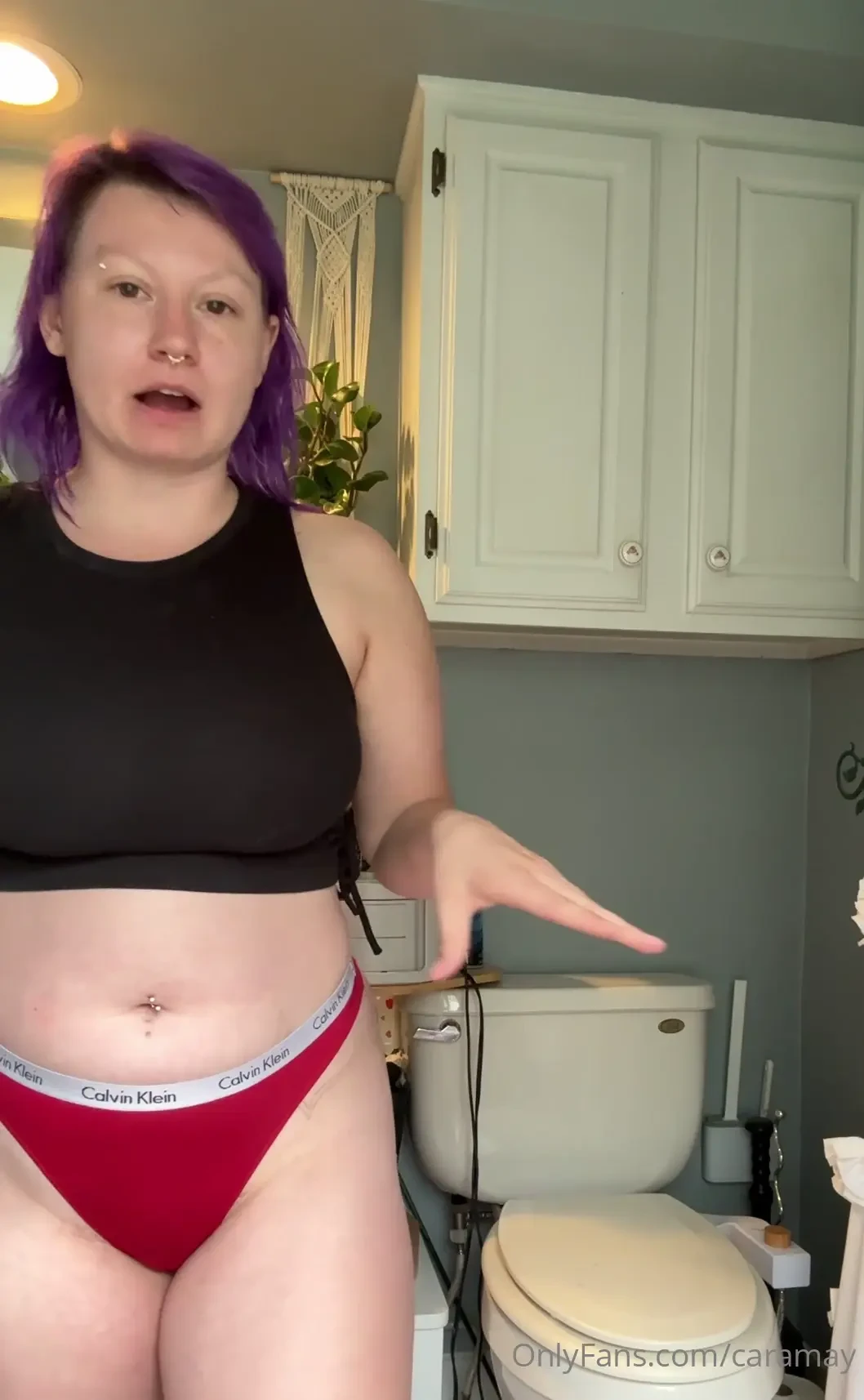 Trying on a new latex skirt 