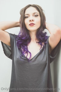 Looking at old pictures like this makes me miss my purple hair i m