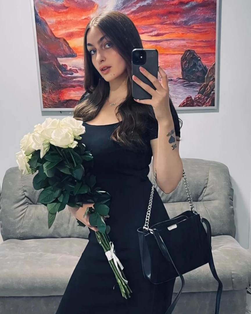 Through the black dress my secrets bloom 