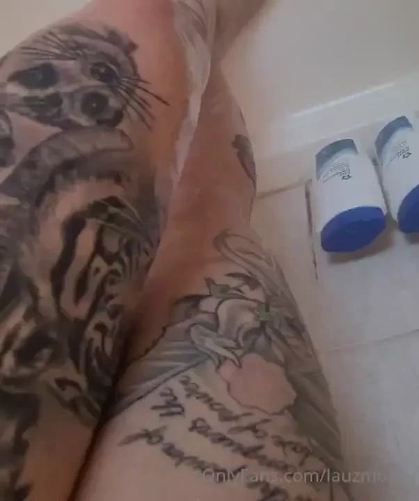Feet getting a good wash in the shower 