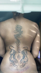 Not finished but y all like my new tramp stamp