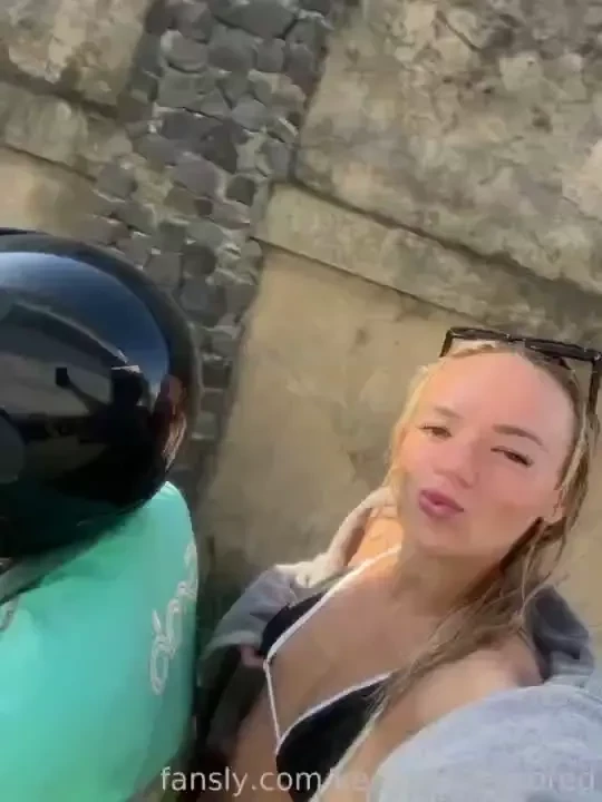 Flashing my tits on the back of the scooter down the main road 