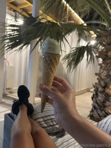 Enjoying a delicious green ice cream cone on a relaxing evening