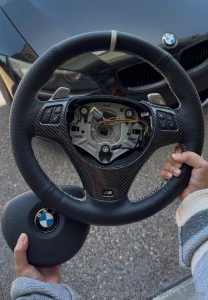 Reinstalling my steering wheel on my e92 today i actually retrimmed it part 1