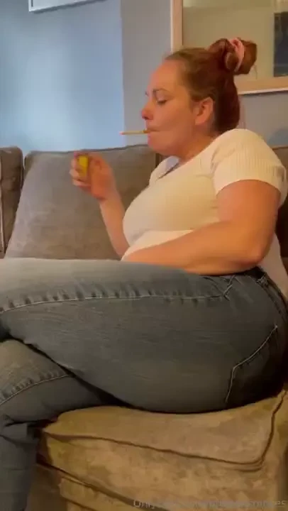 Smoking and relaxing on the sofa natural look 