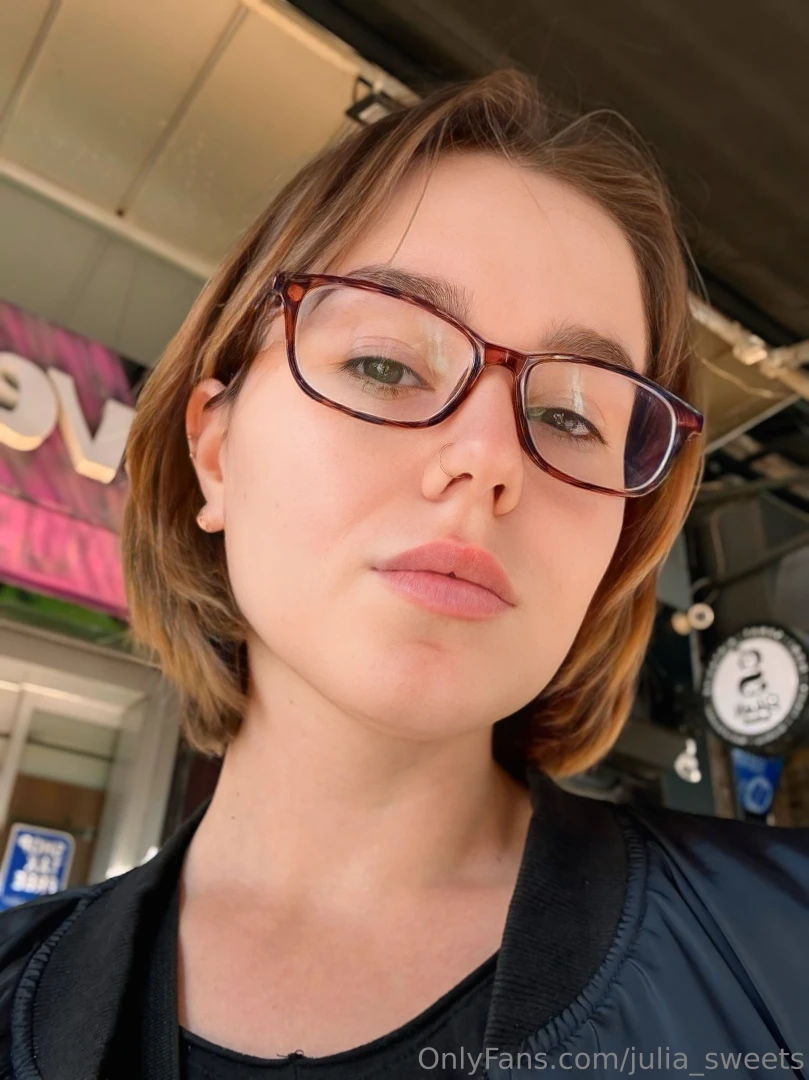 Eyes hidden behind big glasses mind lost in little thoughts 