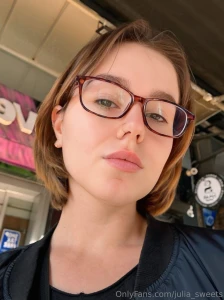 Eyes hidden behind big glasses mind lost in little thoughts