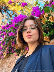 Everything s blooming even me petals in the air warmth in the heart