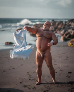 Sea sun sand you and me naked on a deserted beach