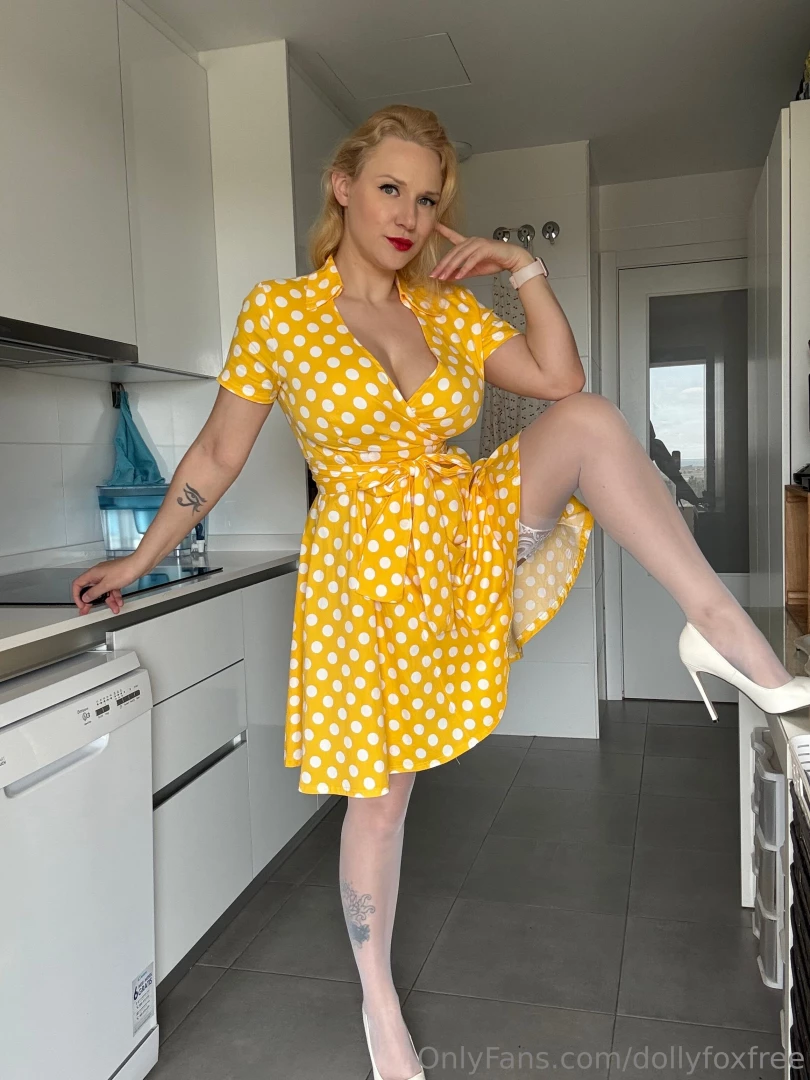 Getting frisky in yellow polka dot dress 