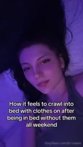 House in the suburbs with a white picket fence and a dog