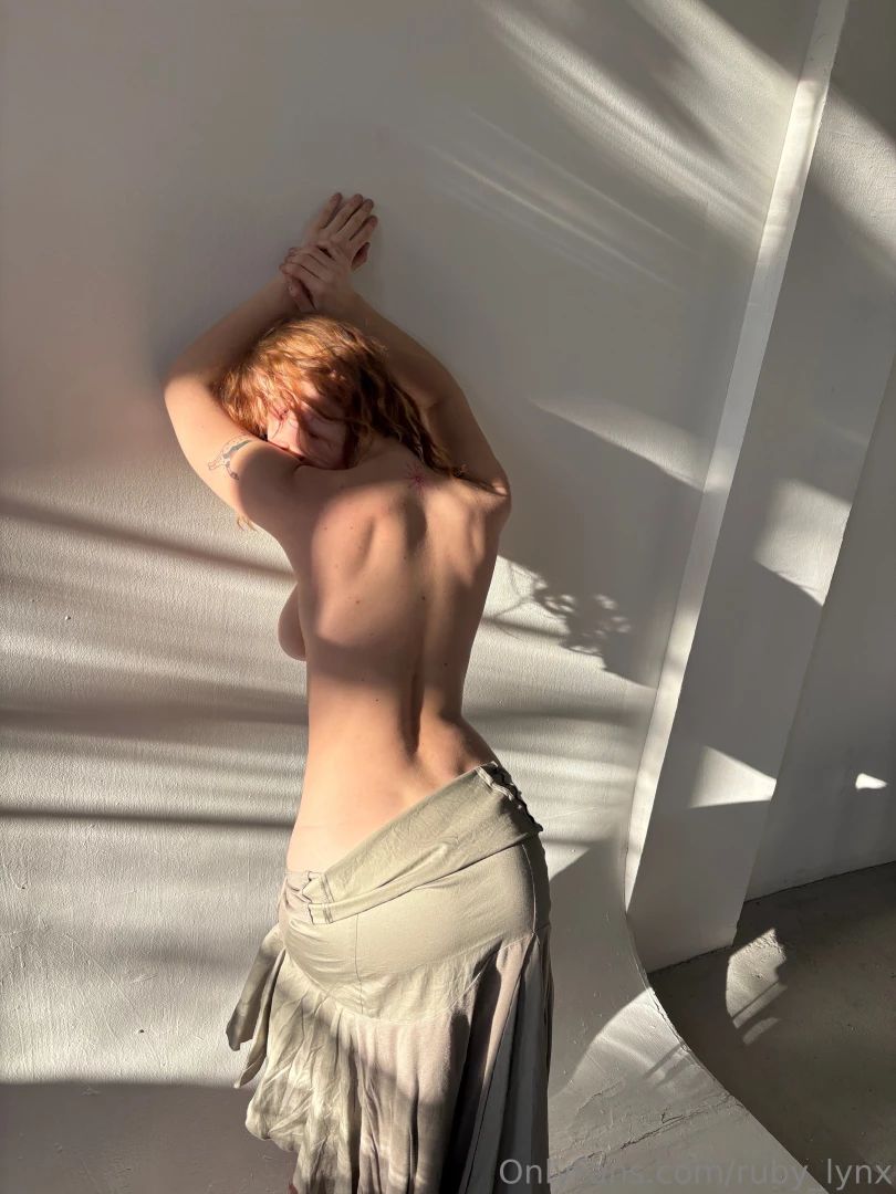 The touch of light on my skin like a quiet whisper of your gaze 