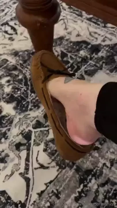 A lil moccasin dangle over my new rug 