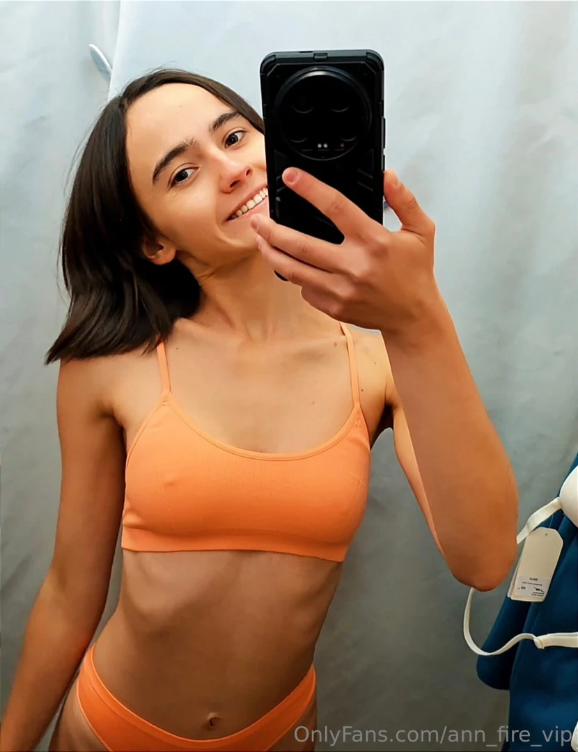 I tried on this orange top today do you think it looks good on me 