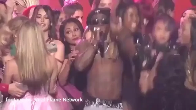 Dancing on stage with lil wayne at last year s avn awards red sparkly 