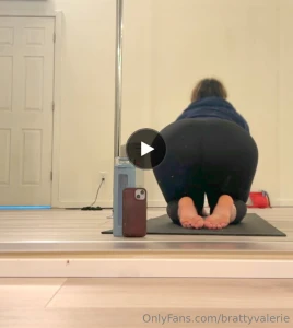 Stretching in black leggings showing off my ass and teasing sensually