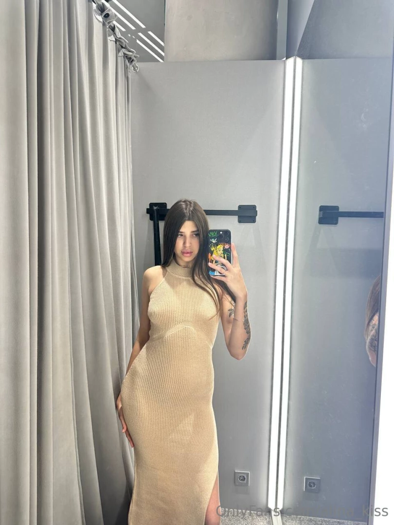 Trying on a dress but something is missing maybe someone who will tell 