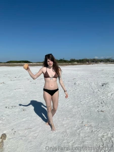 Obsessed with looking for shells and wearing bikinis