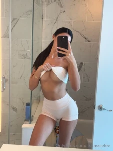 This sizzling top isn t hiding much maybe i ll take it off if you tell