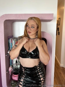 Squeezing them so you can slide it in