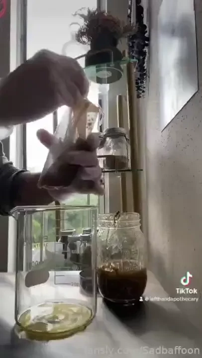 Straining the oil infusion used in my moisturizing face balm going to 