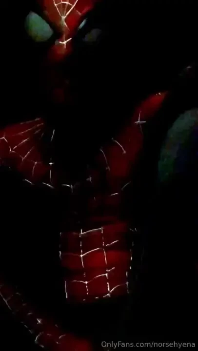 Spidey has some private time fireworks go off in the background while 