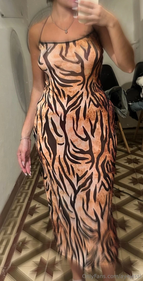 Does this dress look elegant to me or just highlight my sexy curves 