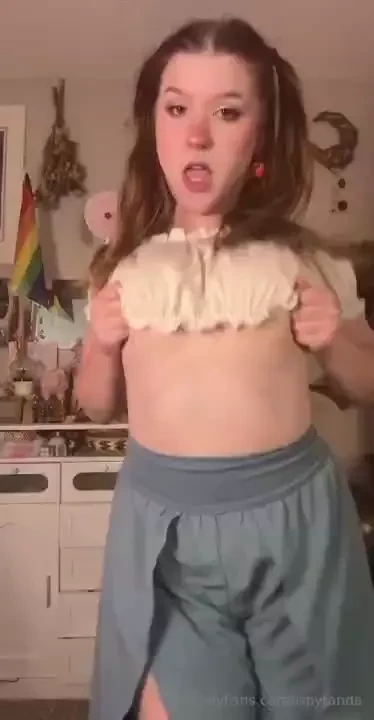 Flowy blue pants and some high pigtails 